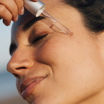 Zenicure REJUVENATING FACIAL OIL dropper on face