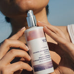 Woman holding My Om World AROMATIC BODY MIST