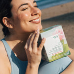 Woman smiling with Rose Cucumber Box 